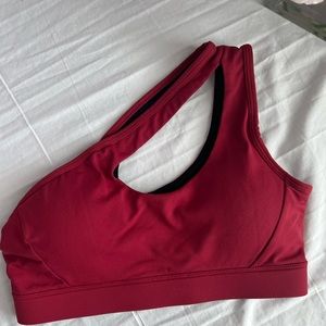 Red one shoulder sports bra medium